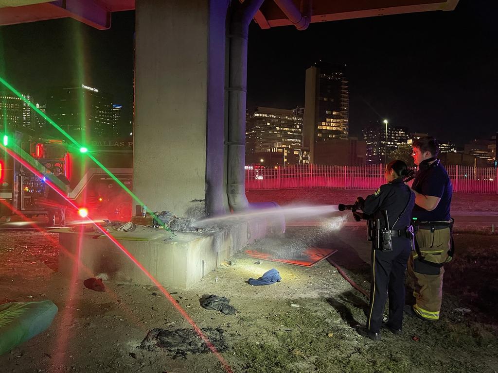 Busy night already, giving the #firefighting thing a try!! Officer Granados assisting @DallasFireRes_q putting out a small fire.
