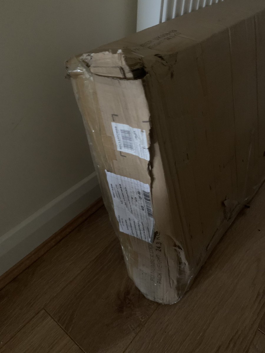 RogerBrakspear's tweet photo. TV stand delivered from @johnlewishelp and it looks like it’s been thrown round the warehouse, ripped and I now pray that it’s all in one piece and not damaged seeing as this was a replacement from one that was missing 1 piece!!! https://t.co/pnzOeuVKDP