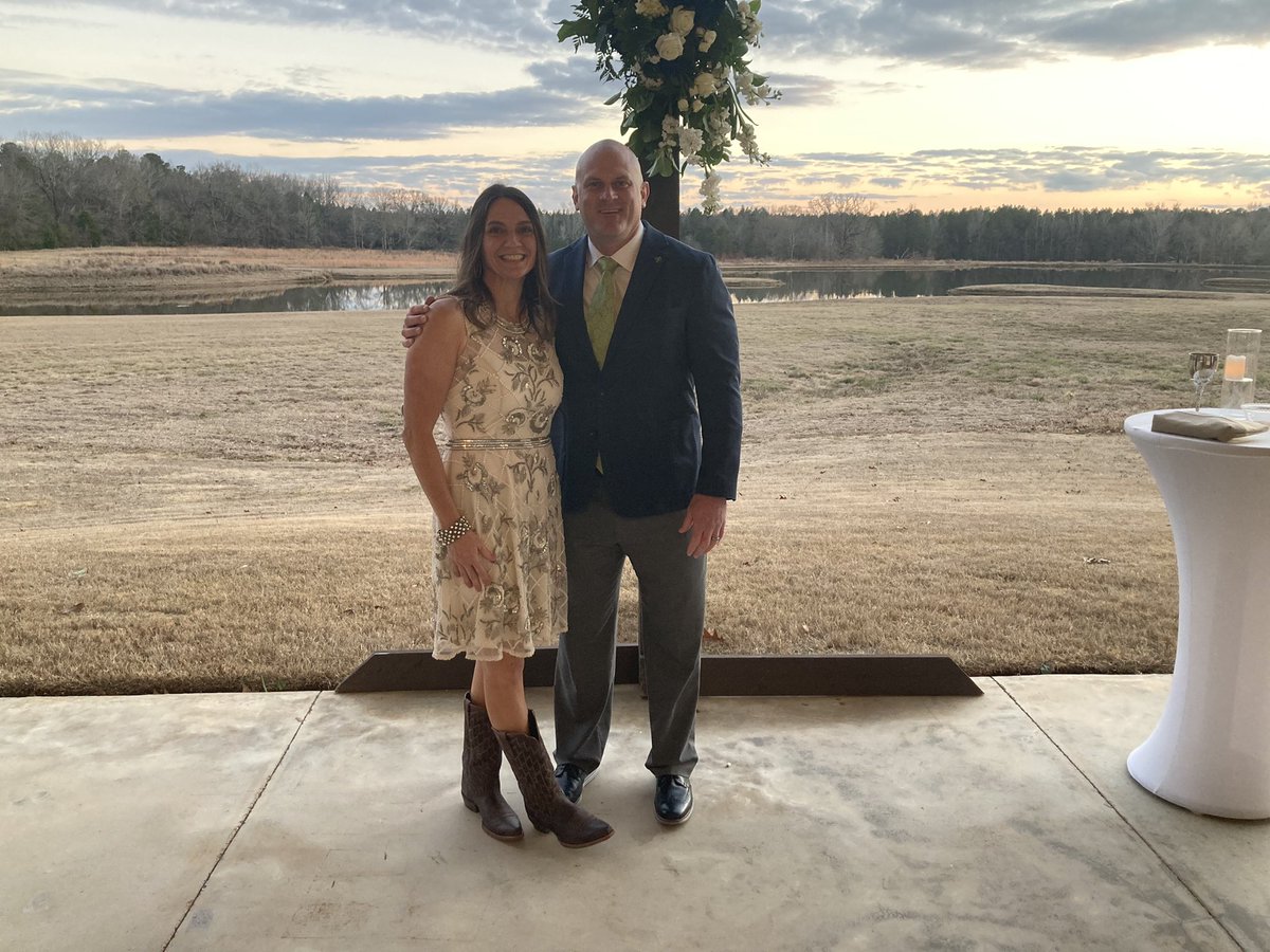 BlaineMcCorkle's tweet photo. No better way to spend NYE than w/ Mrs Gina on our anniversary while celebrating the captains wedding w/ the @BelhavenFB family. Congrats to Mr. Ben &amp; Mrs. Carly Owens!! #BUnited 
🔰⚔️🏈💍🙏🏻 https://t.co/qj25TCct0Y