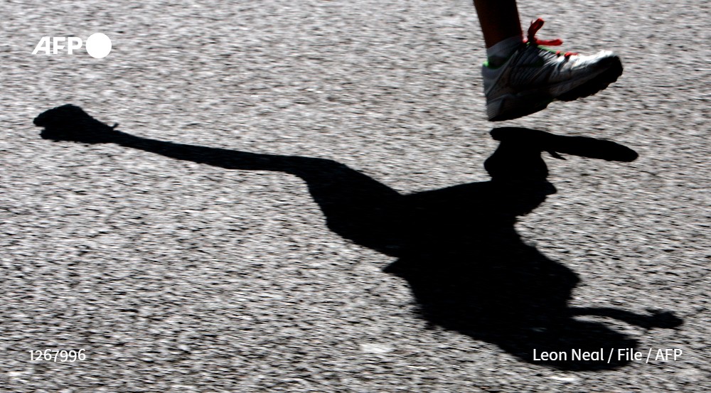 AFP's tweet photo. A British fundraiser rang in the New Year by completing his quest to run a marathon every day of 2022, reaching his £1 million ($1.21 million, 1.12 million euros) goal just as 2022 drew to a close ▶️ https://t.co/IkYjjD44AF #GaryMcKee https://t.co/8bl6eh1vxo