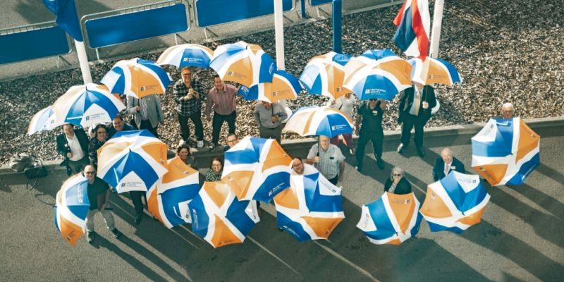 Can you spot me in this photo of me holding my new Recognition Express branded golf umbrella branded with the new logo? If you're a business owner, what is your plan for 2023? Please call to see how I can help your business stand out from the crowd. #standoutfromthecrowd