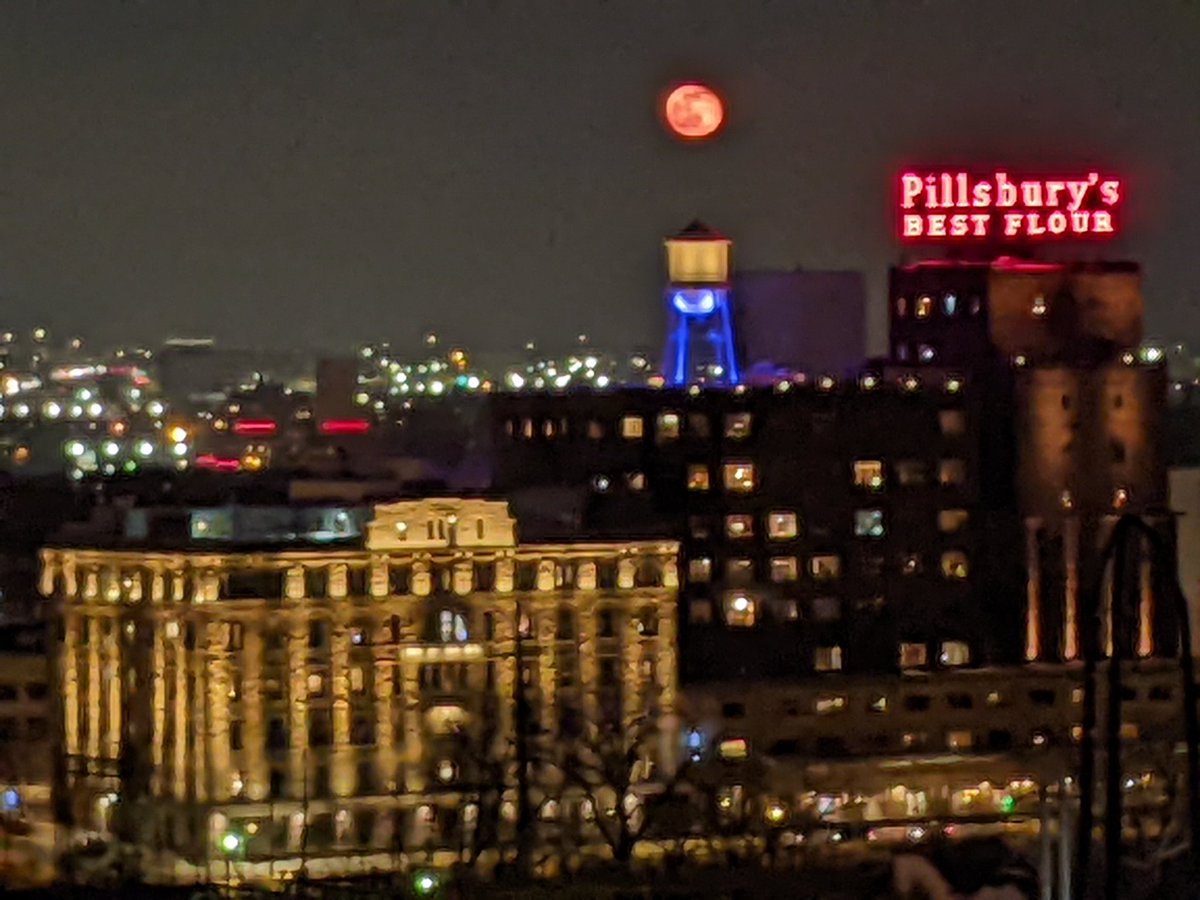 The old milling district in Minneapolis gets a Sunday evening visitor.