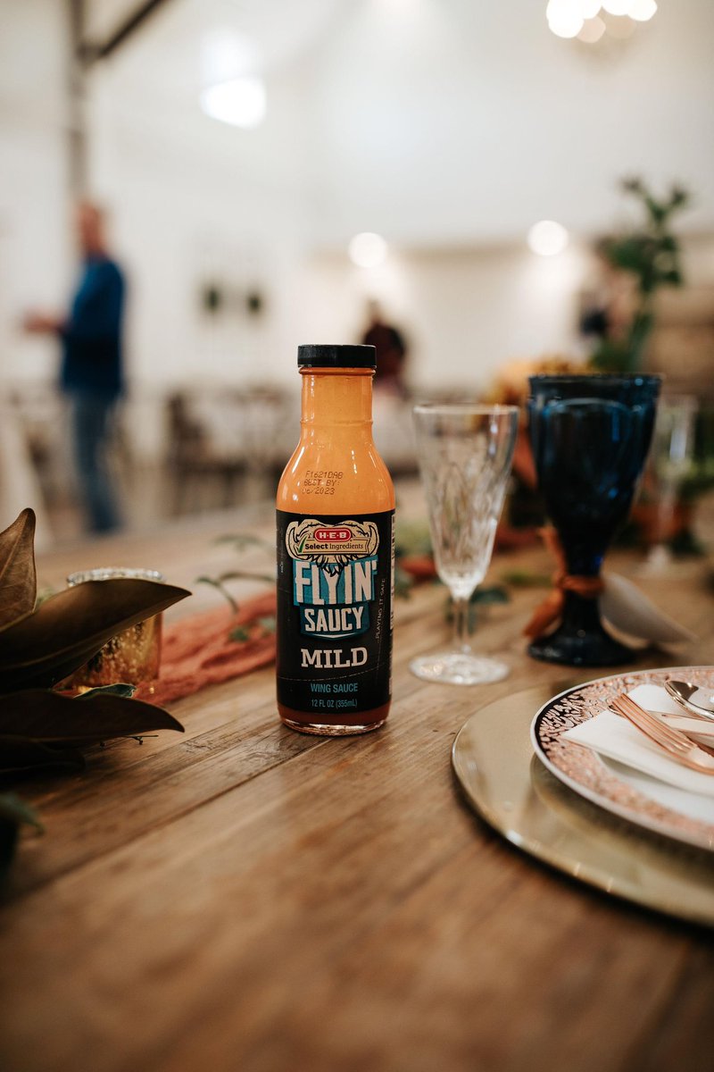 Flashback to when I asked my husband to bring the buffalo sauce from the fridge in his apartment to our wedding so I could use it on our chicken and waffles and our incredible photographer (<a href="/sannharvey/">Sarah Harvey</a>) captured this gem of <a href="/HEB/">H-E-B</a>’s flyin’ saucy