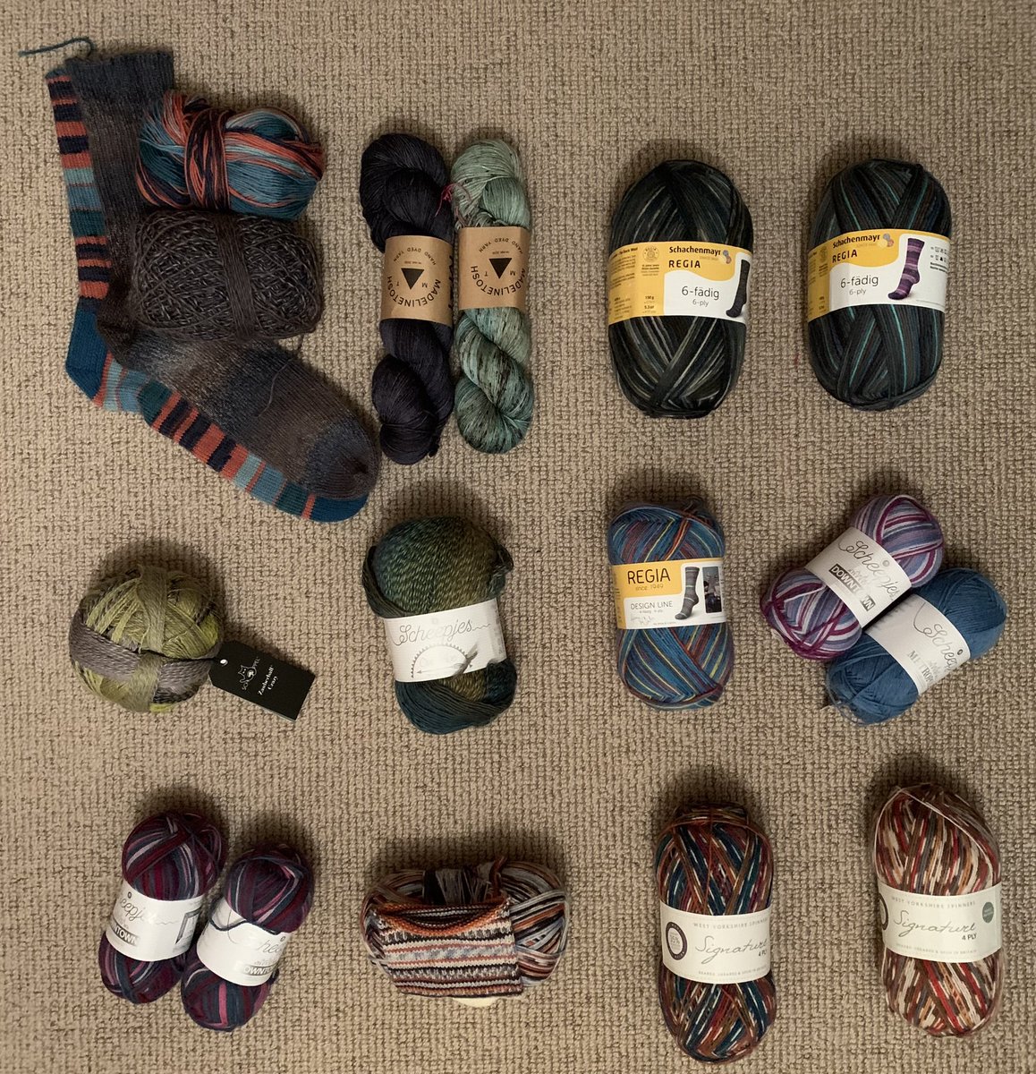 LivRunsFast's tweet photo. Inspired by @PebbieCanada, I’m doing a pair of socks/month for 2023. It aligns w/my other goal of #KnitYourStash.
Jan is gonna have to be the mates to 2 pairs in progress…that’s a pair, right? 😏
Oct will be a restart of a toe-up that I don’t like the shape of. 
#KnittingTwitter https://t.co/iQbrJQaDnV