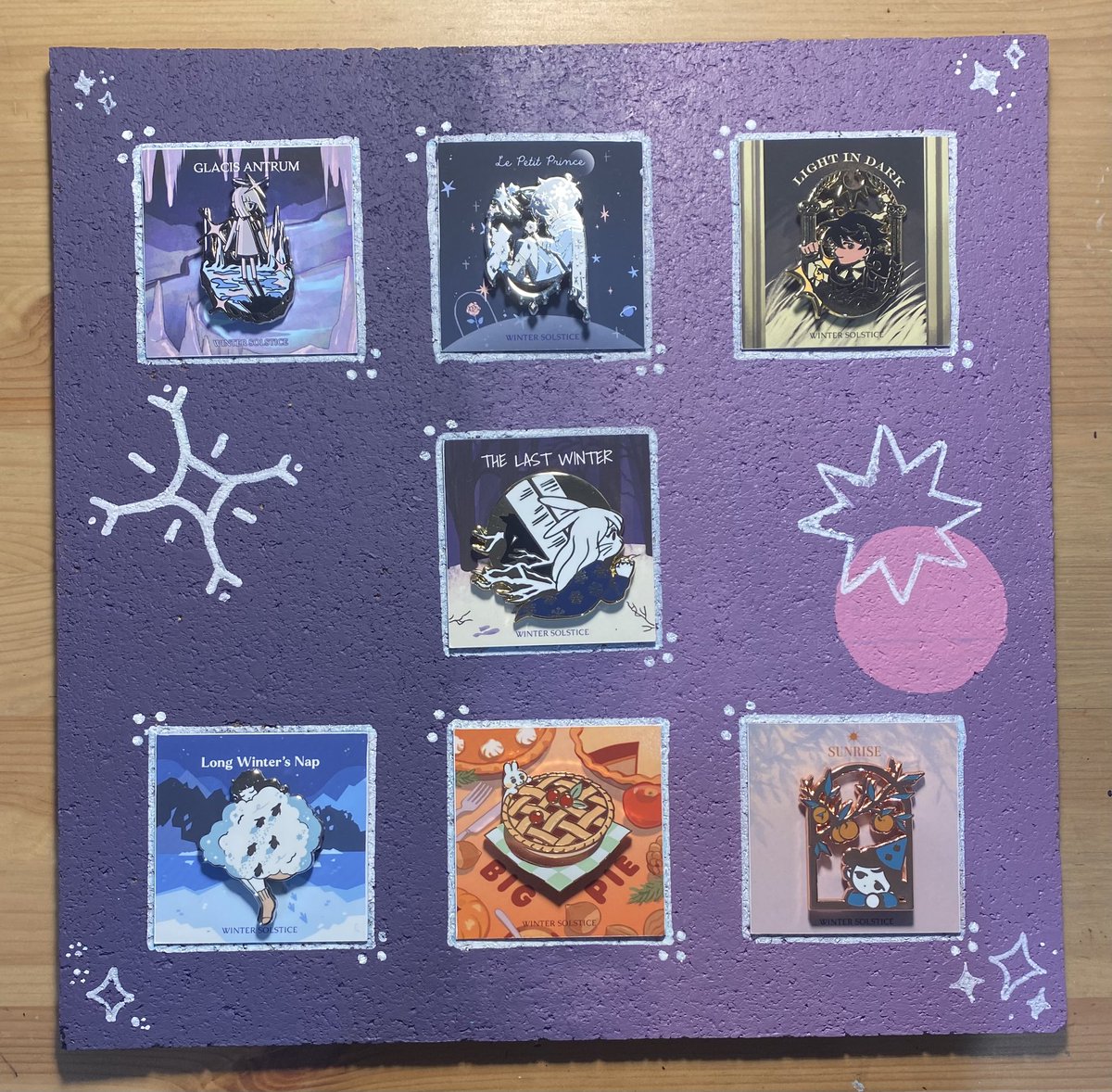 noezel7's tweet photo. First finished project of 2023! Couldn’t bare to get rid of the backing cards for the @WinterPinAdvent so I decided to make a little display for it. https://t.co/XEXVYbaQUK