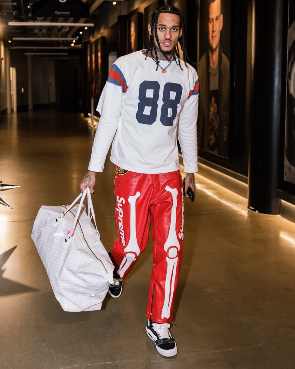 .@jordanclarksons wears a #supreme x #vansonleathers pants, and @vans vault ua knu-skool vr3 lx sneakers with a @goyard bag for the @utahjazz vs @miamiheat game. #upscalehype #jordanclarkson #vanson #vans #goyard #nbastyle