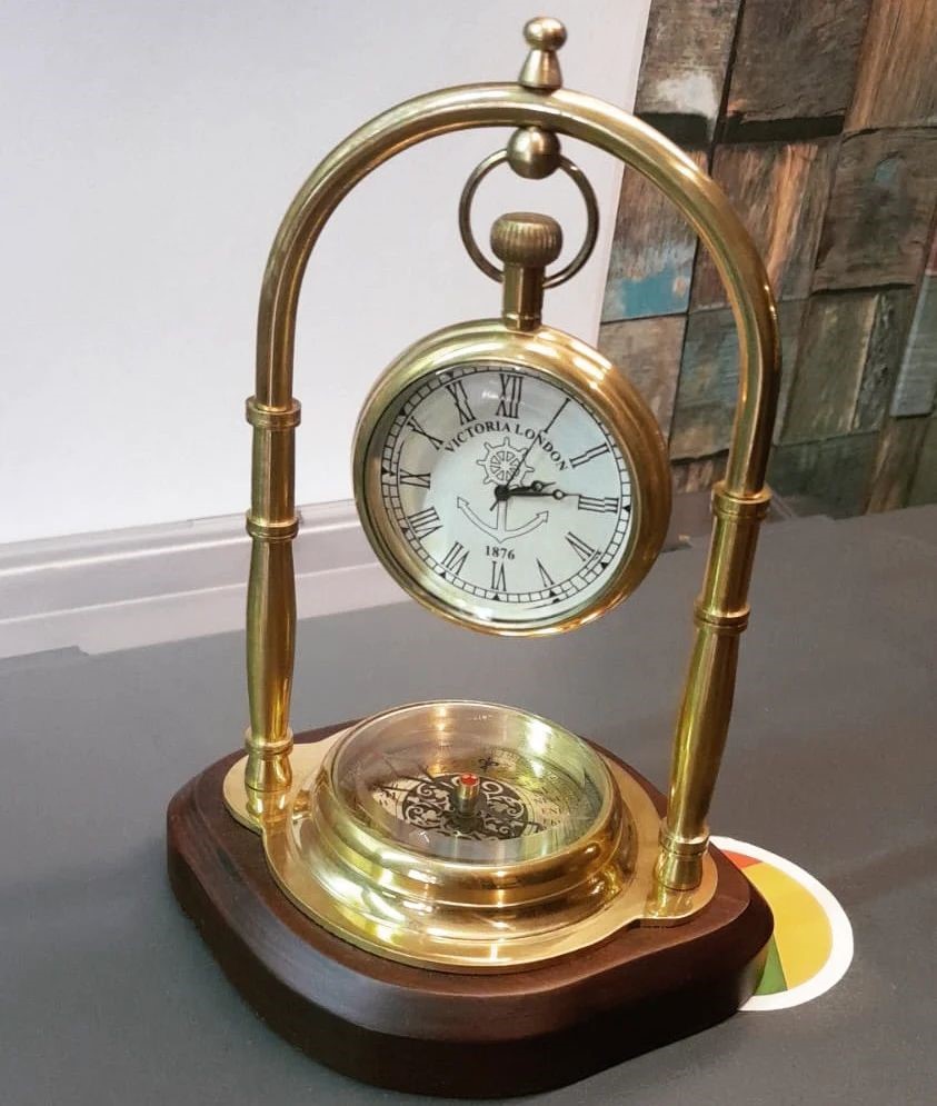 Antique Brass Table Clock With Compass On Wood Base inhouse now at Lucknow store.
UP MSME Mart
7th floor, Summit Building
Gomti Nagar LKO.
Call -6390005459
#woodenclock #wallclock #homedecor #woodenkeychain #livingroomdecor #wallclocks #clockdesign #woodenengraving #antiqueclock
