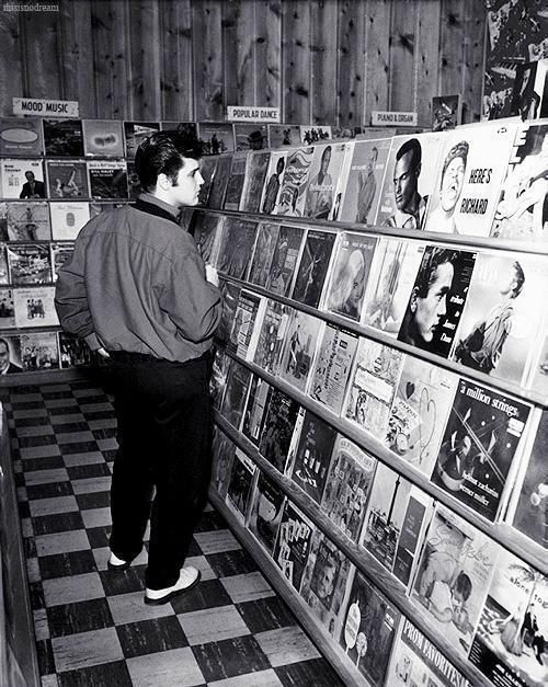 Elvis shopping for records in Memphis, 1957.