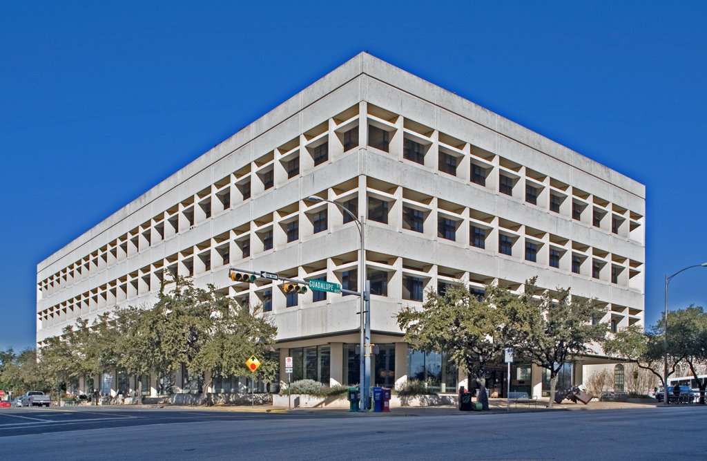 nancywdinan's tweet photo. Doing some research and coming across photos from 70s/80s Austin. This was the library where I spent so much time as a kid, reading in a castle covered in beige carpet. It's no longer operating -- there's a new library now. Such a sense of possibility when you walked in. https://t.co/kNPYnmKUYU
