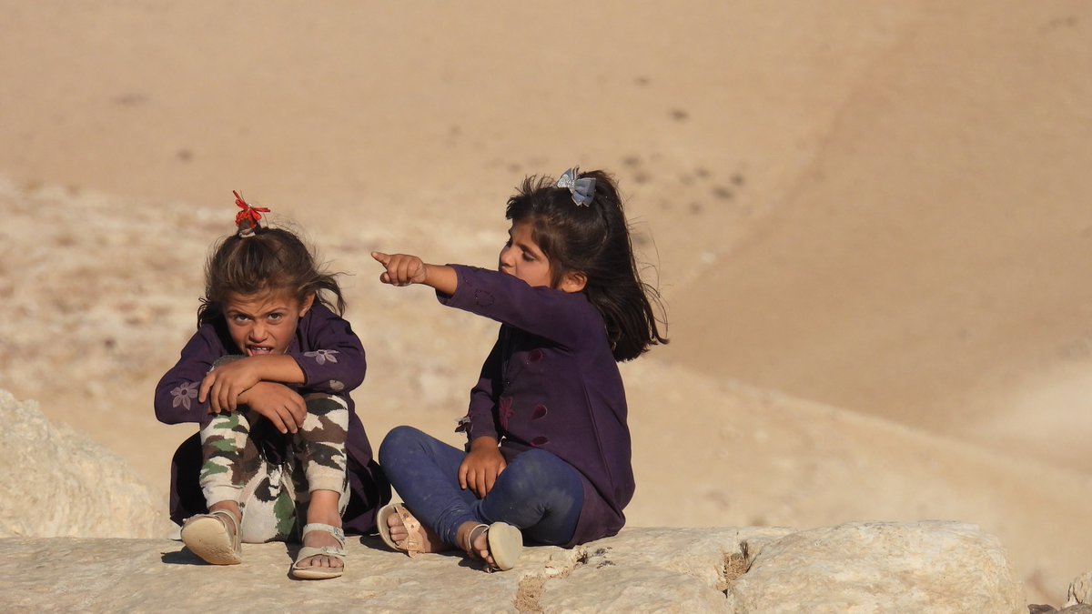 Ali_awad1998's tweet photo. The Israeli occupation warning the two little girls in the photos with +1000 other humans from #Masafer_Yatta to commit a war crime against us .  
today, the occupation announced the intention to start with displacing the villages in the next few days .
 #ongoingNakba https://t.co/pMKTEZCQnE
