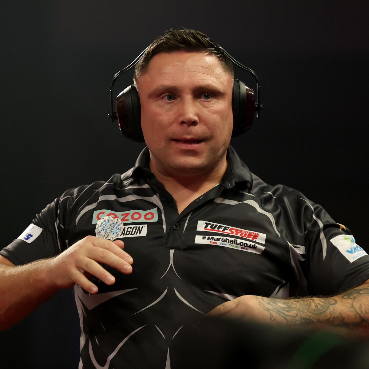 Darts Legend John Lowe doesn’t appear to be a fan of the Gerwyn Price ear protectors