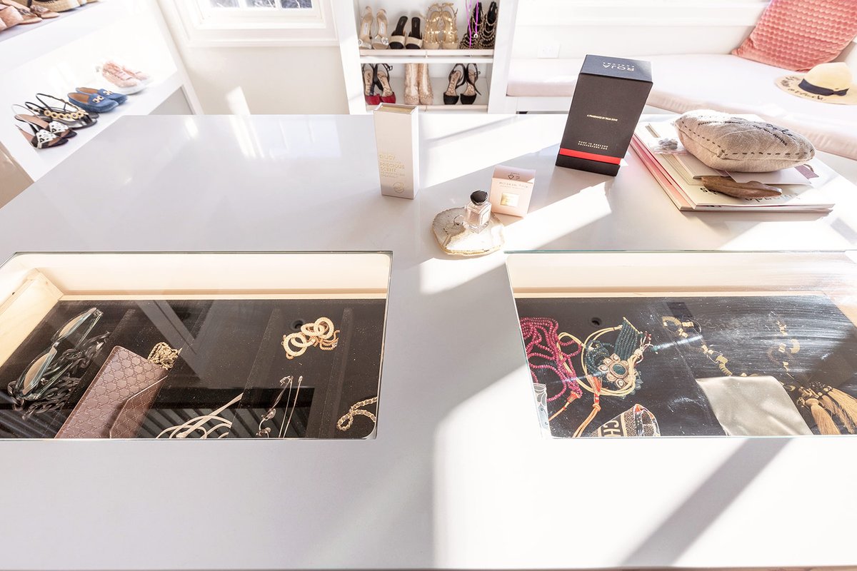 We love the glass doors, open display shelving, and built-in lighting. This is one gorgeous #CustomCloset that leaves us wanting more! bit.ly/3Q20kNh