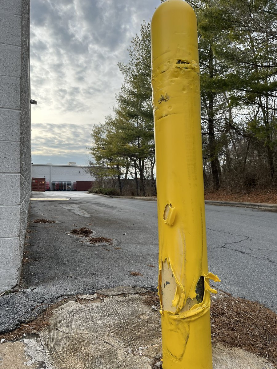 Rvorosma's tweet photo. The old grizzled veteran. You can still see his scars, lo, these many years. Thank you for your service, protecting us from harm. #bollards https://t.co/611rfaQ0XN
