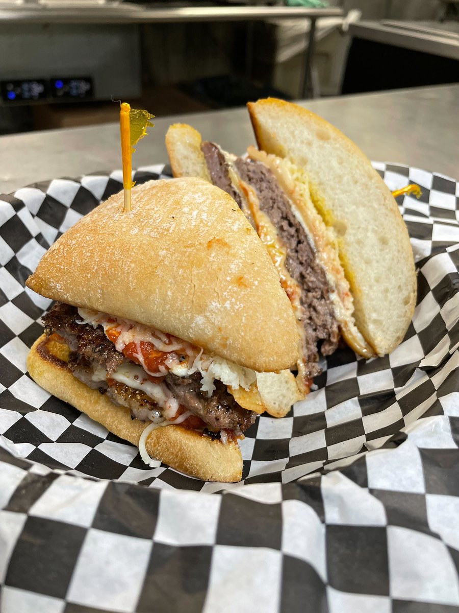 Introducing the Lasagna Burger! Swing by the bar or order takeout and let us know what you think!