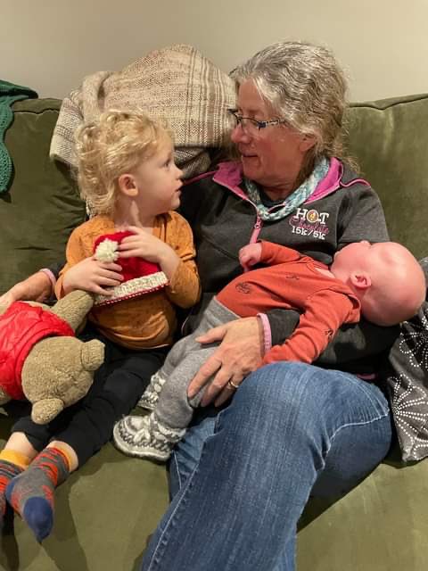 Dawntes's tweet photo. @gradydoctor Cradling my new grandson, while the three-year-old says he wants to “look at Grandma” when his mom asks him to look at the camera. #love https://t.co/e1OJP5ZvT4