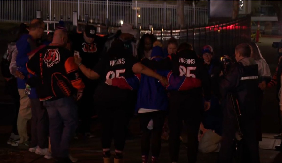 Bengals and Bills fans joined together outside UC Medical Center to pray for Bills safety Damar Hamlin.