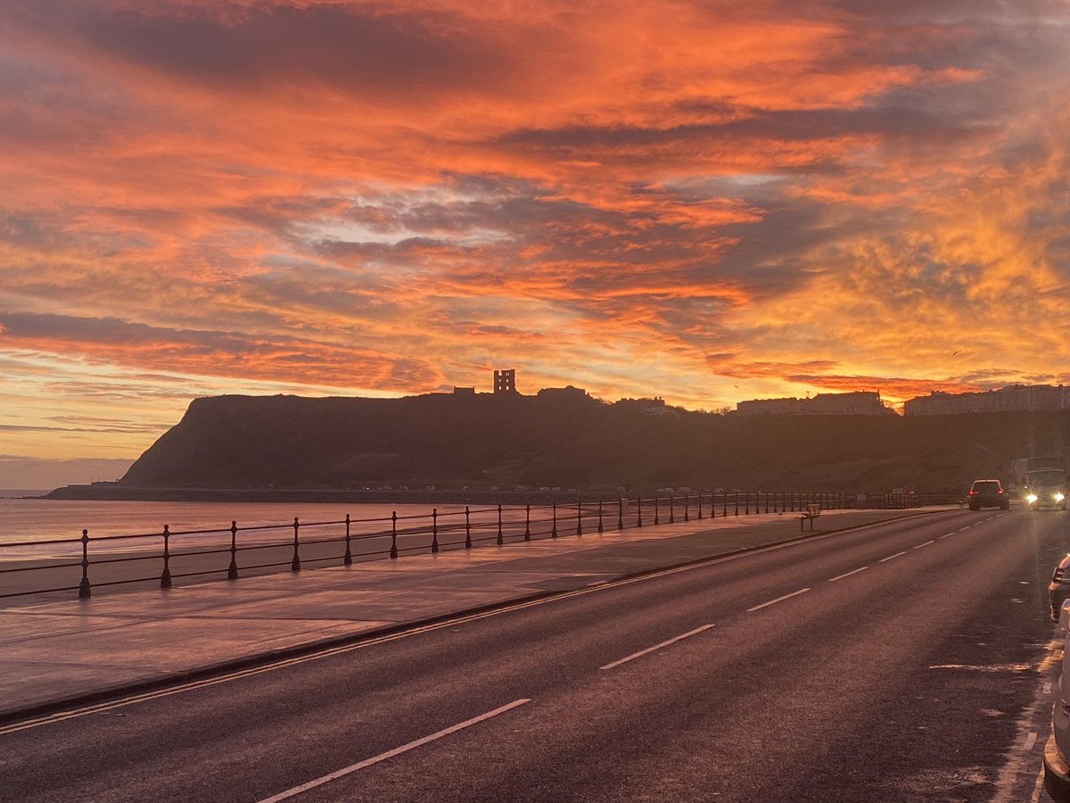 Un-edited photo of the sunrise over #ScarboroughCastle #NorthBay #Scarborough this morning…beautiful.