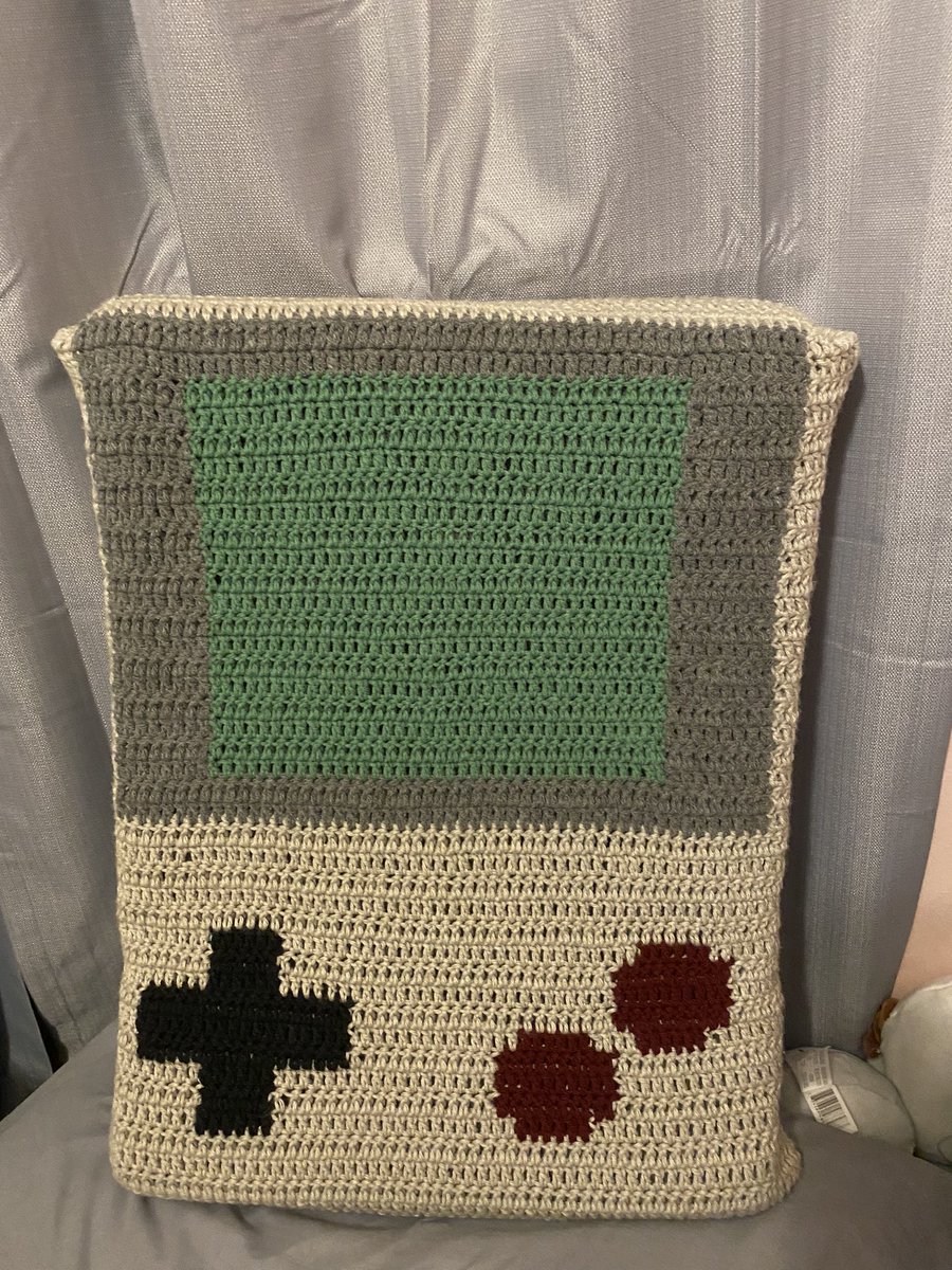 MadeByRye's tweet photo. Gameboy pillow! I made this for my dad for Christmas and he loved it (so does our cat) over all very fun to make! It worked up quickly and it came out well I think! #gamers #videogames #Nintendo #gameboy #handmade #handmadegifts #fiberart #crochet #crochettwt #crochetplushie https://t.co/4ISsUNacC2