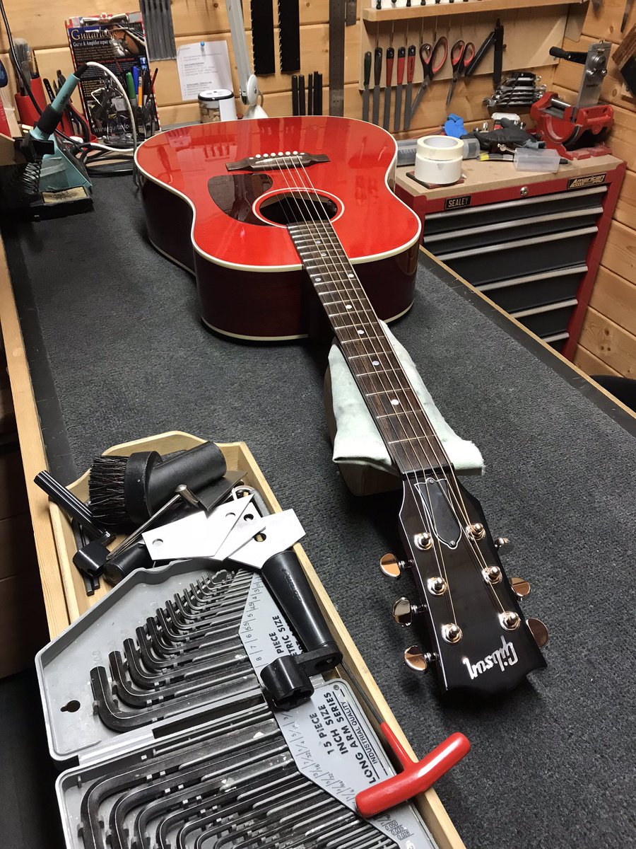 Bridge re-glue on a Martin, various acoustics hanging around waiting to be worked on &amp; a scary surprise inside a Hofner! I’ve found all sorts of things inside many guitars but another time. Gibson J45 during setup #martinguitars #hofnerguitars 🕷