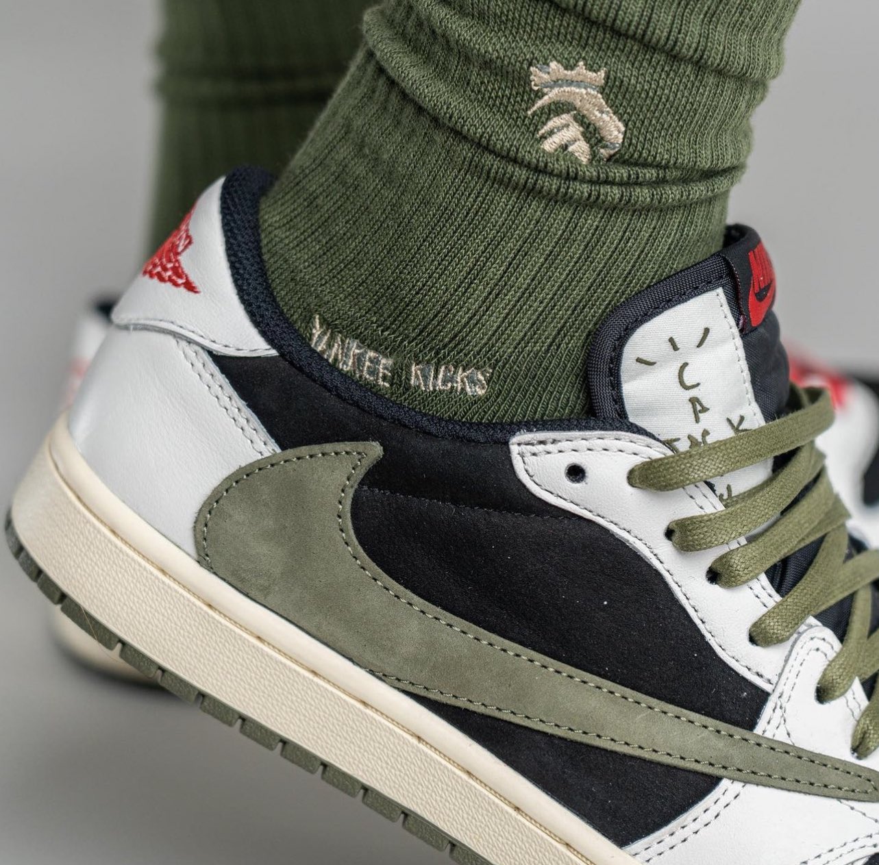 A Closer Look at the Travis Scott x Air Jordan 1 Low 'Olive Swoosh' — Kick  Game