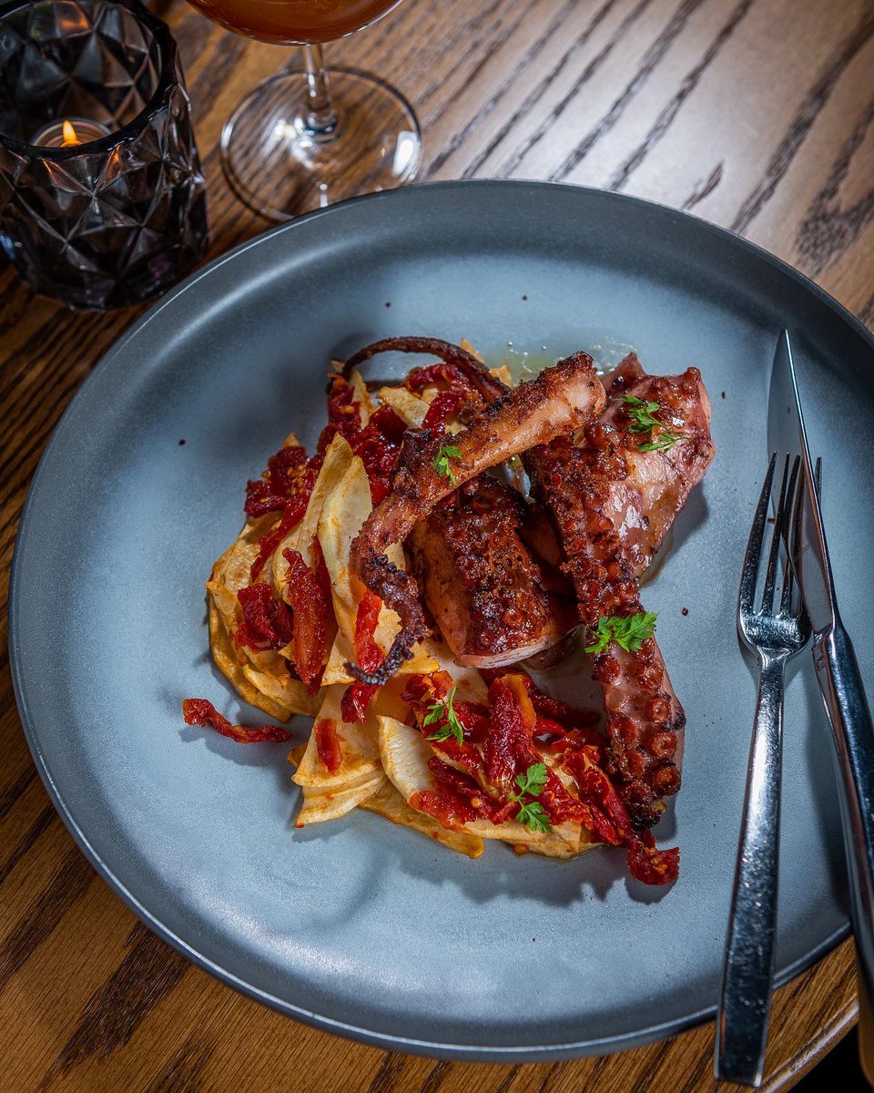Start 2023 in delicious fashion with Grilled Octopus, served with Warm Celery Root Slaw, Preserved Tomato, &amp; Pequin Chili.