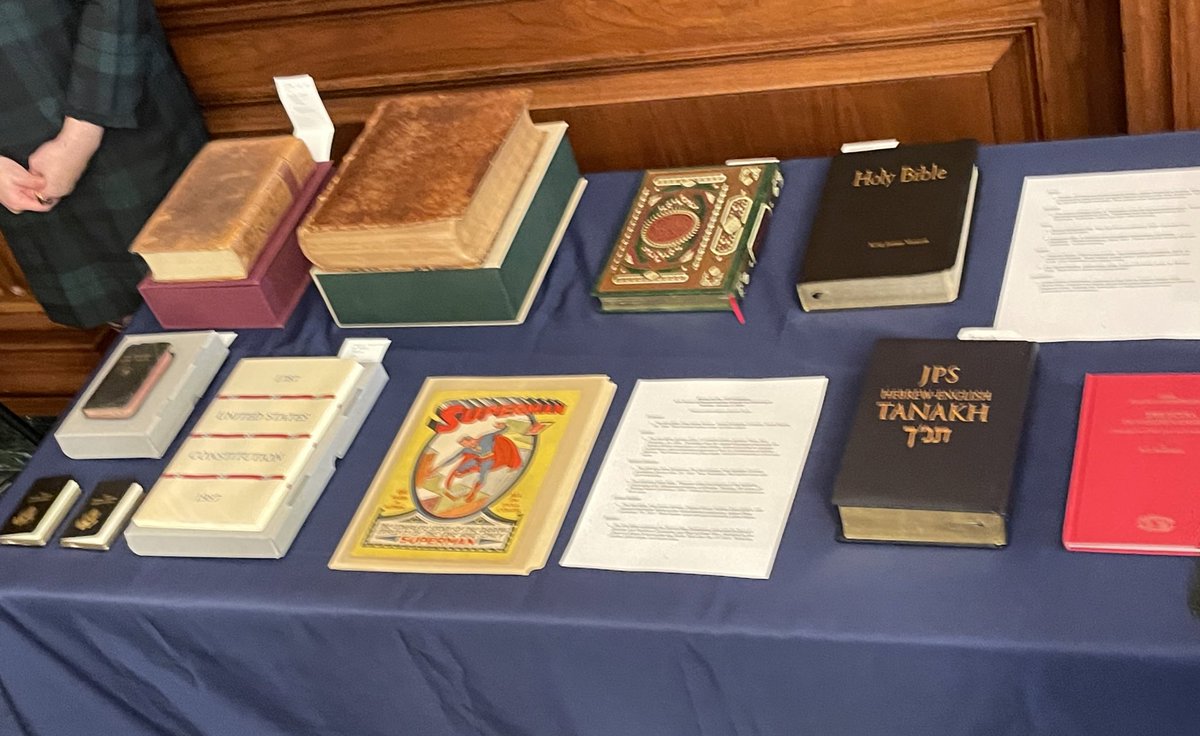 MattLaslo's tweet image. DEVELOPING: A member of the House of Representatives is taking their oath on a classic Superman comic book