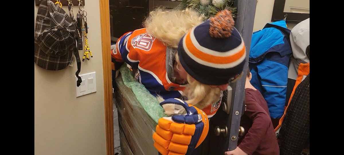 MertonWolf's tweet photo. It's a few days late, but got a visit from reg! Pretty solid dude hooked me and the kids up with crazy oilers swag for Christmas! https://t.co/ji8QpPKf0X