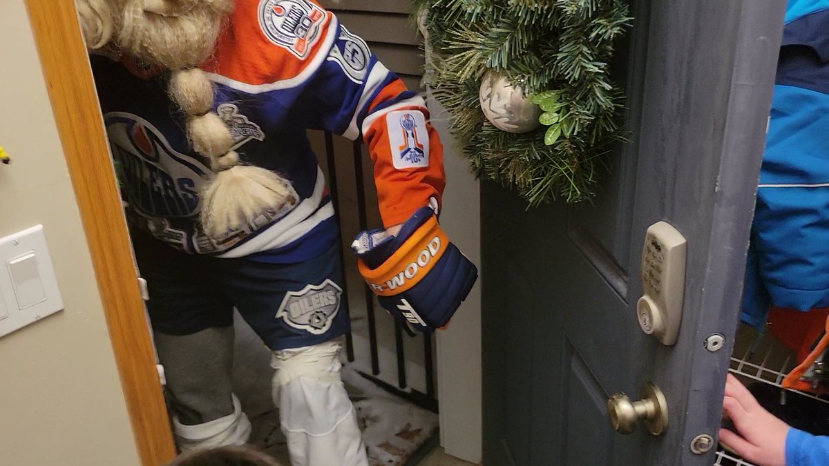 MertonWolf's tweet photo. It's a few days late, but got a visit from reg! Pretty solid dude hooked me and the kids up with crazy oilers swag for Christmas! https://t.co/ji8QpPKf0X