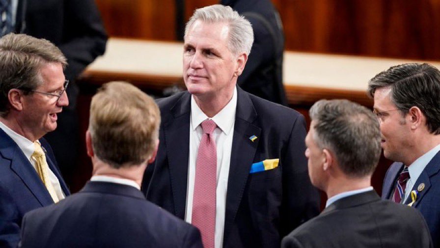 No freaking way this idiot should be the speaker.  Wearing yellow and blue in his pocket shows his allegiance!  <a href="/RepMTG/">Gargorie Taylor Mreene</a> didn’t know you were on the Ukrainian train too!!