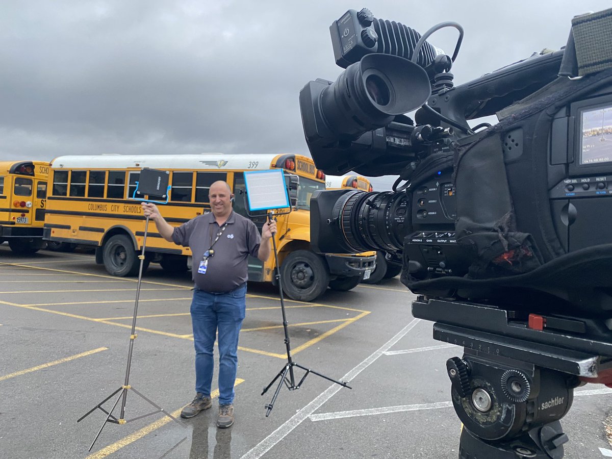 StoiaLu's tweet photo. Photojournalist Chris Baggs lighting us up for live shot. Columbus City Schools rolling out a new transportation plan tomorrow morning following Winter Break.CCS says it’s the first time ever they have implemented new routes in the middle of the school year. #busdrivershortage https://t.co/GEMSZ0riQl