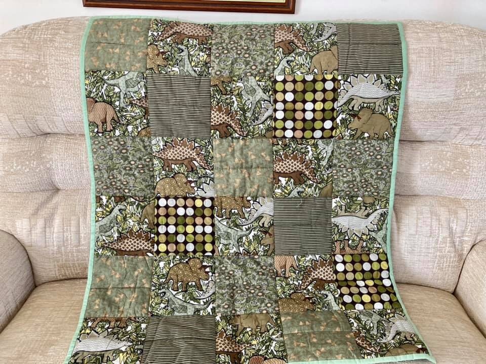 QuiltsforDreams's tweet photo. Excited to share the latest addition to my #etsy shop: Small hand made patchwork dinosaur theme quilt. The patchwork is quilted onto a soft plush grey fleece. Hand sewn bindings https://t.co/dNQxkDjeYL #green #grey #patchwork #adult #polyester #dinosaurtheme #patchwork https://t.co/0S7gNwMXHO
