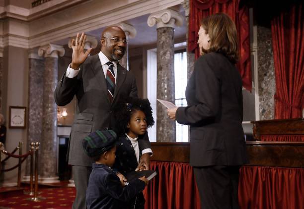 KamalaNation's tweet image. Rev Raphael Warnock (Georgia) being sworn in by VP today. Notice how his girls look up to her. ❤️ 😍