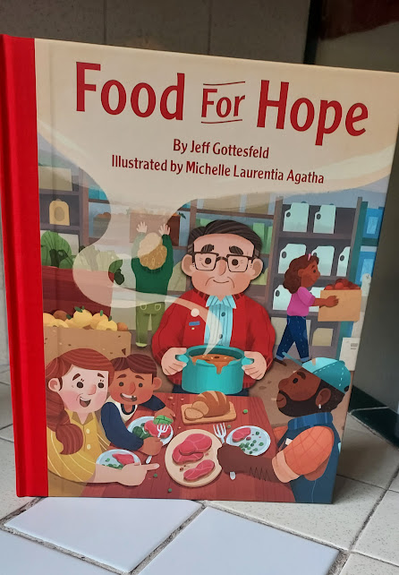 jeffgottesfeld's tweet photo. First edition #FoodforHope hot off @CrestonBooks presses, in my hands, and it looks amazing. And Michelle Agatha's illustrations! On sale 2 May. The unlikely, nearly impossible faith-filled story of how food banks came to be. #foodbanks #foodpantry #faith #volunteerism https://t.co/Id80ihfMe3