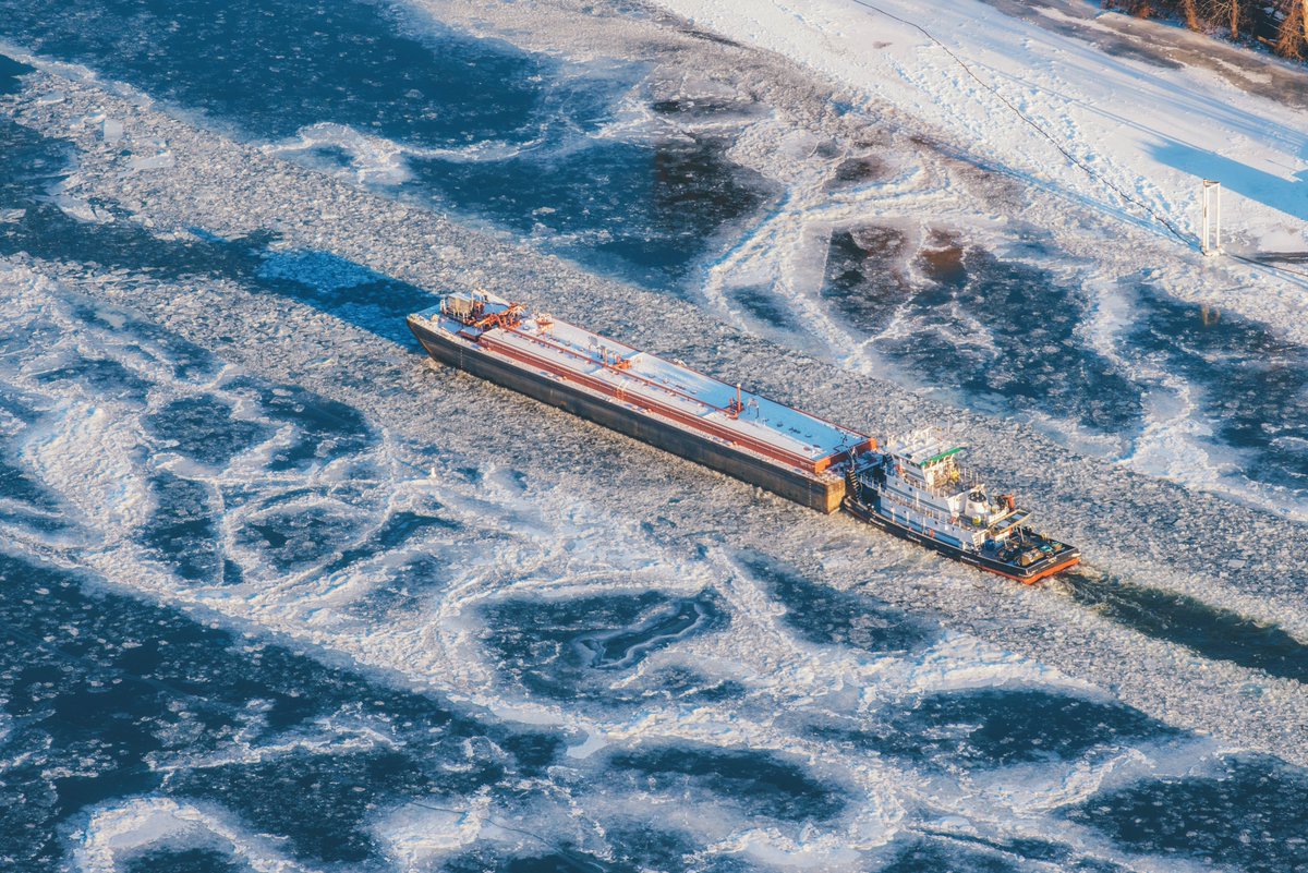 DaveDiCello's tweet photo. Exactly 5 years tonight I was the coldest I think that I've ever been. Hanging out the door of a helicopter in 16º weather, capturing the frozen rivers of #Pittsburgh...it was brutal. But man, was it worth it. Watching that barge cut through the ice on the Allegheny was amazing. https://t.co/XgVGBdeUhY