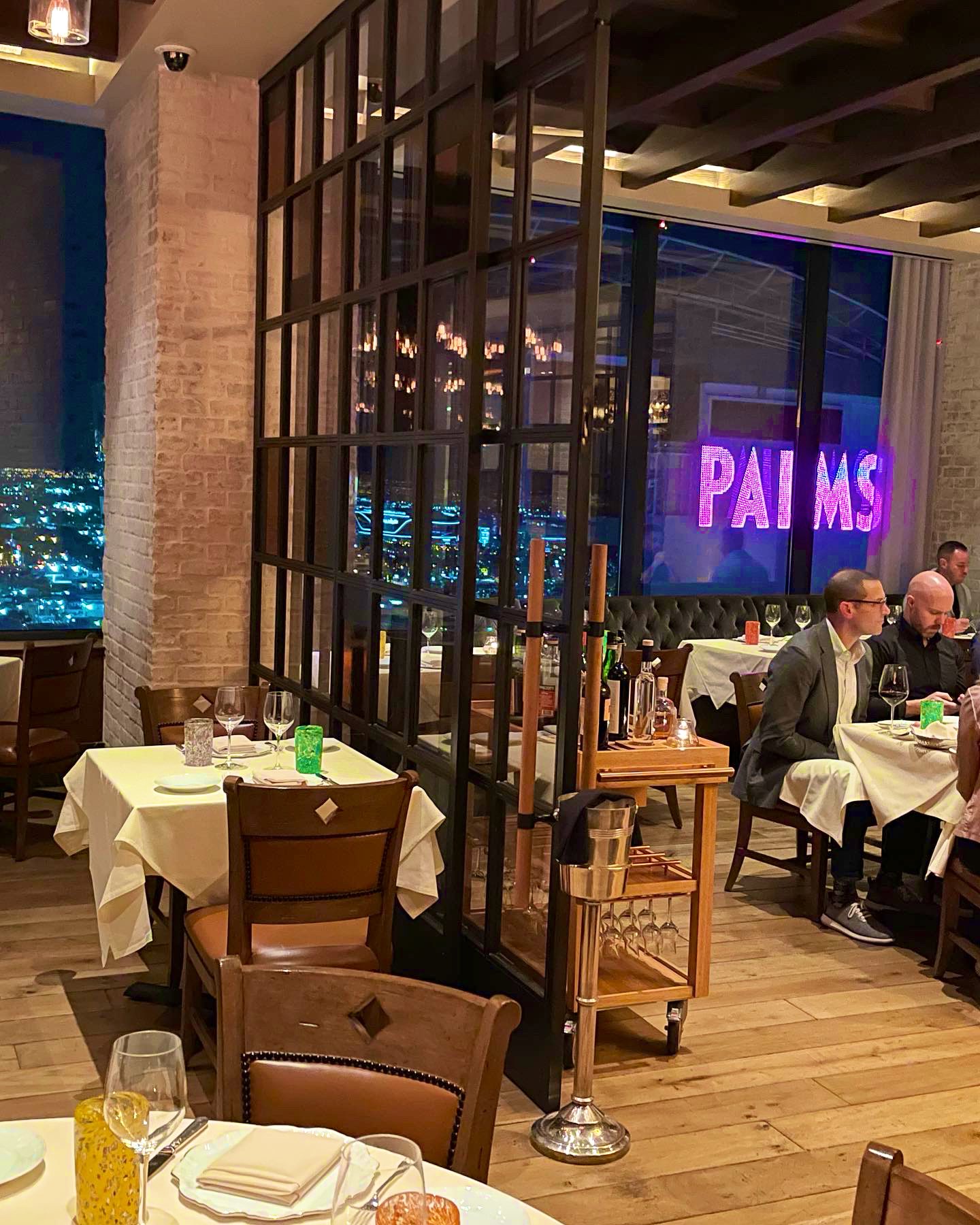 Onion's solid ash and plywood restaurant interior in Bangkok