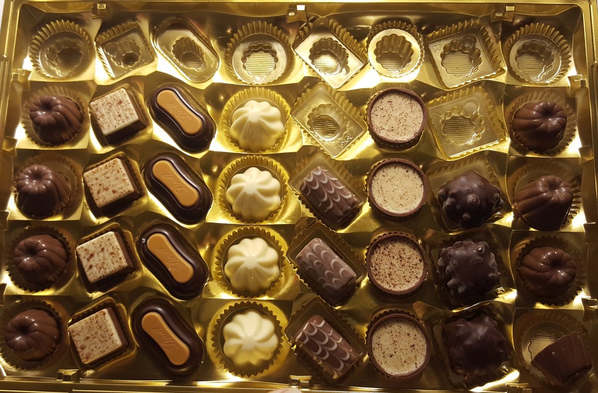 ulfrvif's tweet photo. The highlight of my day... I found Christmas chocolate on Sale... $60 of fancy chocolate for $20! These are big boxes of chocolate! https://t.co/bFmXPRcecN