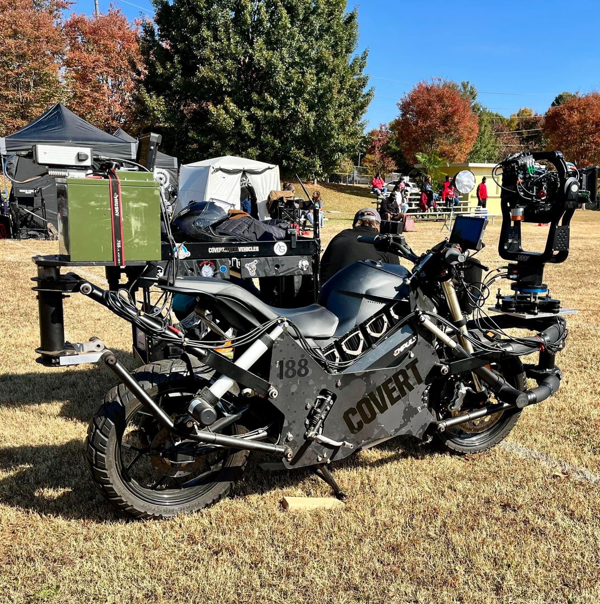 Mark_A_Nash's tweet photo. On-set theyโre using this super-cool silent Empulse electric motorcycle rigged with an Arri film camera setup. Of course being a motorcycle & film guy I find this thing fascinating- Iโm a nerd. ๐ฌ๐ฅ. #IamMAN https://t.co/4MFMGC0uMN
