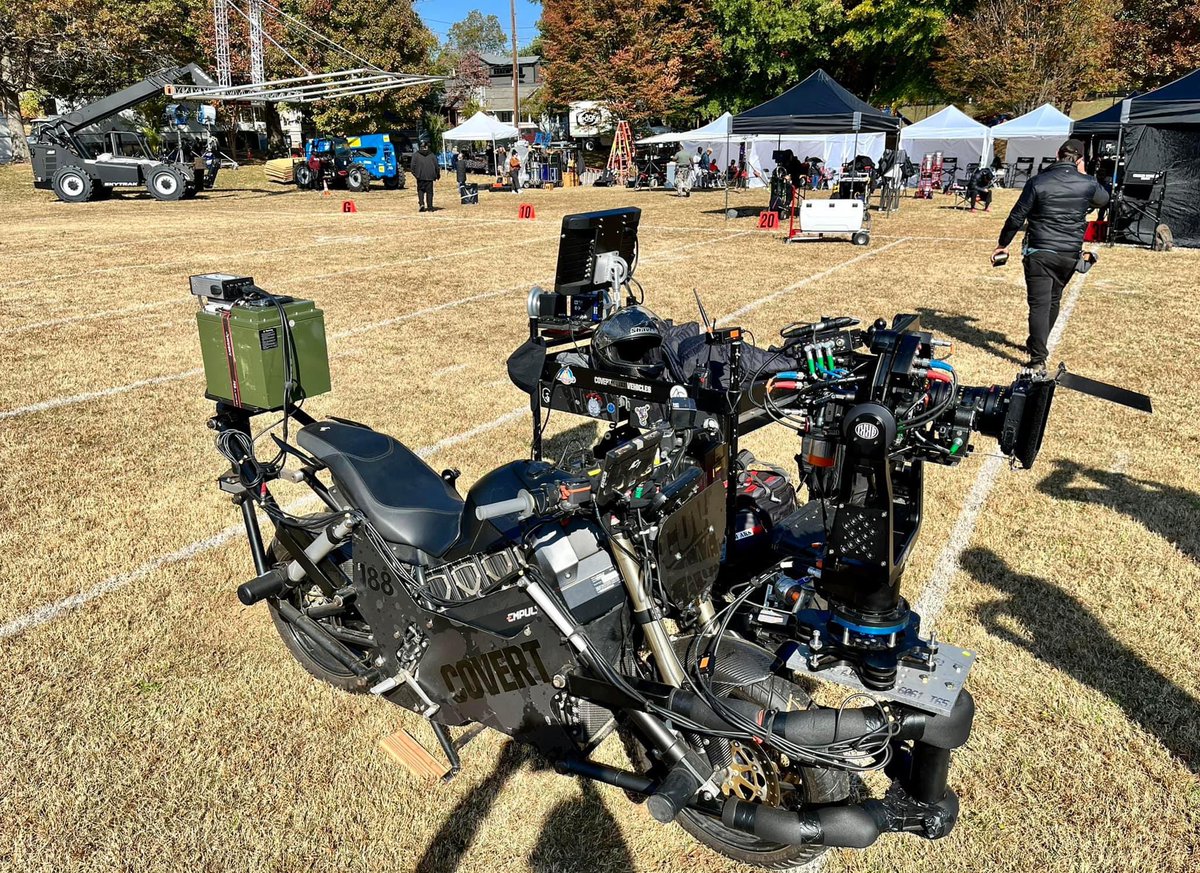 Mark_A_Nash's tweet photo. On-set theyโre using this super-cool silent Empulse electric motorcycle rigged with an Arri film camera setup. Of course being a motorcycle & film guy I find this thing fascinating- Iโm a nerd. ๐ฌ๐ฅ. #IamMAN https://t.co/4MFMGC0uMN