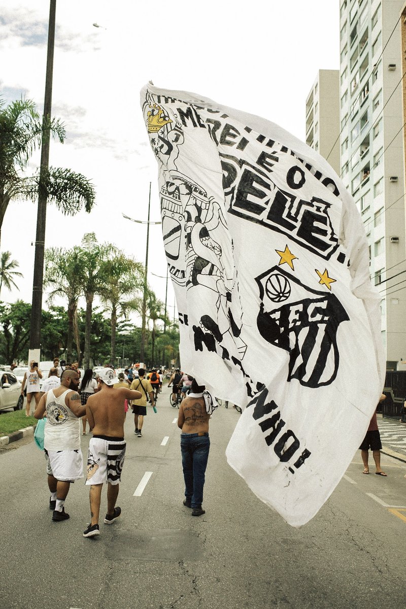 ACMomento's tweet image. Thousands lined the streets as Pelé's coffin was taken through Santos, allowing fans one more chance to view its most famous son. 

We were there to experience the funeral first-hand, to witness what a player like Pelé — 46 years since retirement — still means to his people.