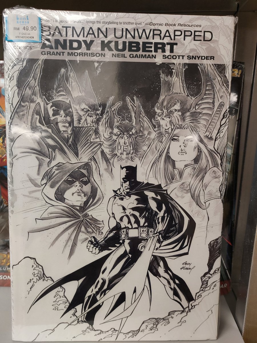 Also, I wasn't expecting to buy anything at Book Xcess, but wellll, I walked past a comic book that has both the words "Batman" and "Neil Gaiman" on it, and next thing I knew, I am paying for it.
I like both the Dark Knight and Neil Gaiman's works (esp the Sandman series)