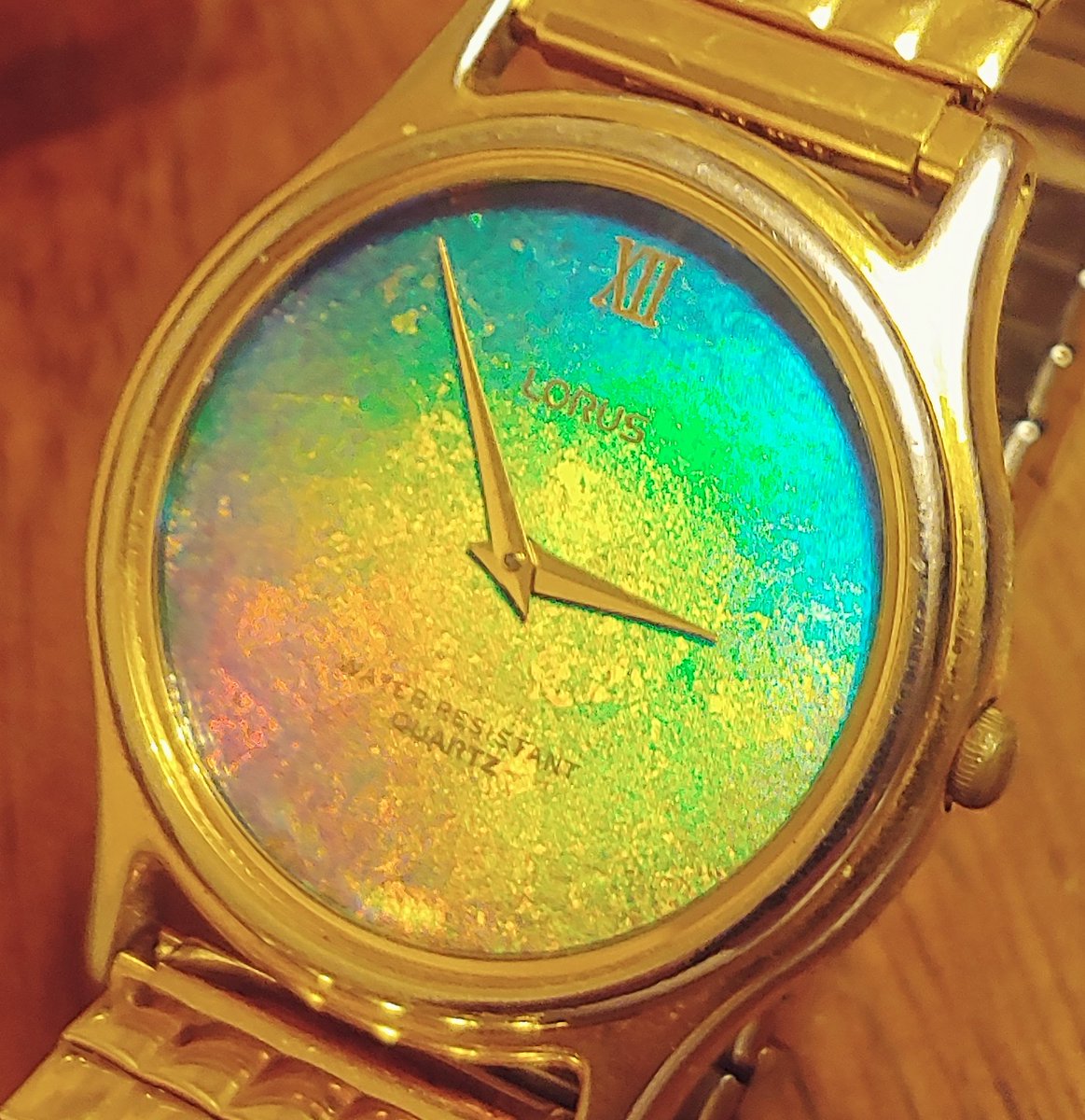 ZagChuck's tweet photo. @seikowatches I have this beautiful Lorus watch for 20+ yrs, has always been my favorite I love it and the face changes color. The gold plating is chipping off the back though, can't wear it Anymore. Is there an option to put it in a new body? https://t.co/pkU3lmQQyy
