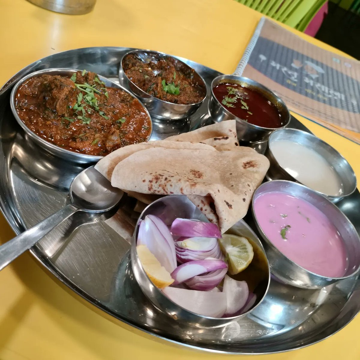 NotMengele's tweet photo. In a small lane off Gokhale Road in Thane, bang opposite the Chitale Bandhu outlet, is Mast Masala, which I can only describe as a meat lover's paradise. Their thalis ars overflowing with delicious food and their solkadi goes straight to your soul. 
Thank me later. https://t.co/uuvGCKmQz0