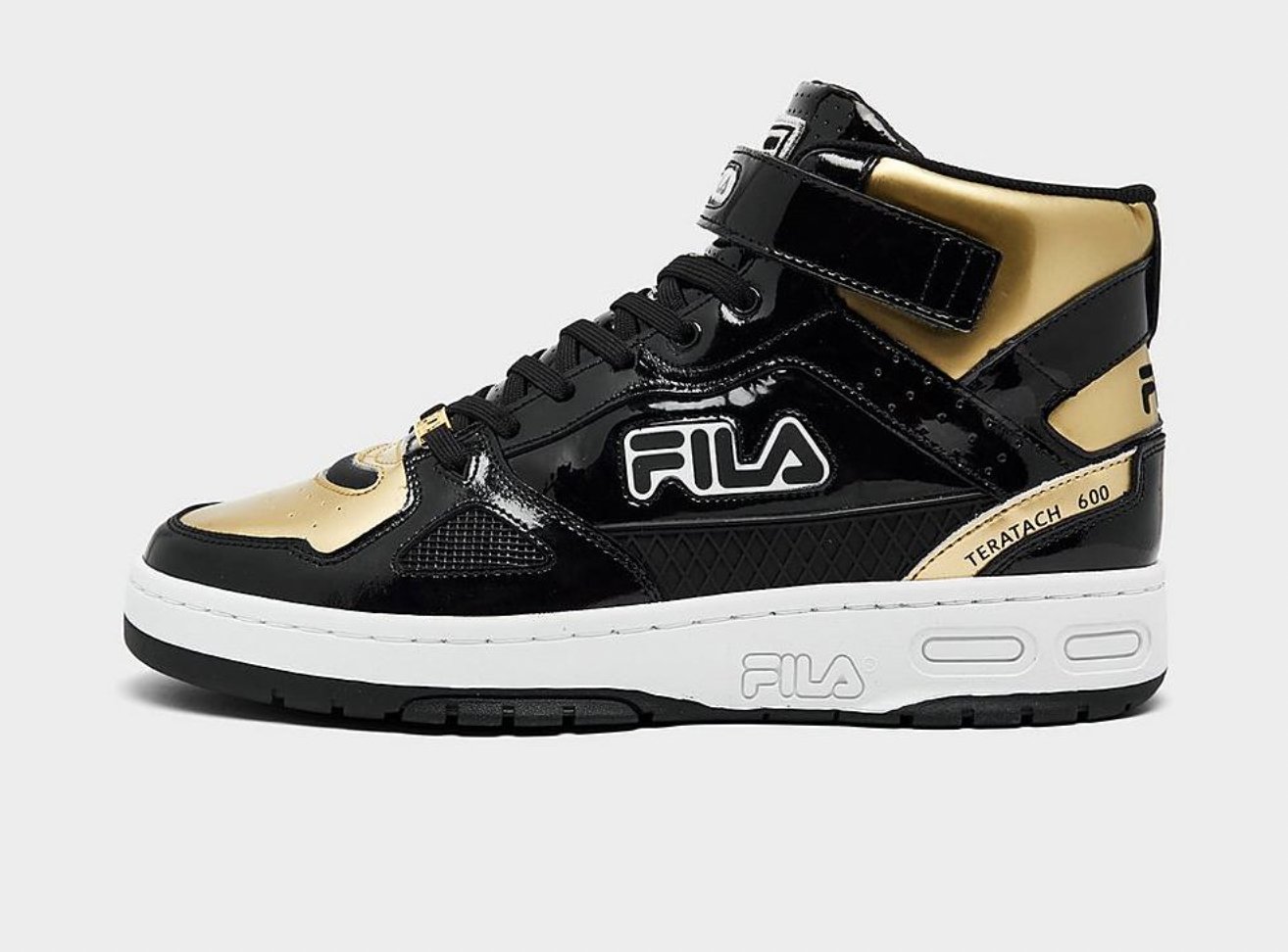 Black and gold fila trainers cheap