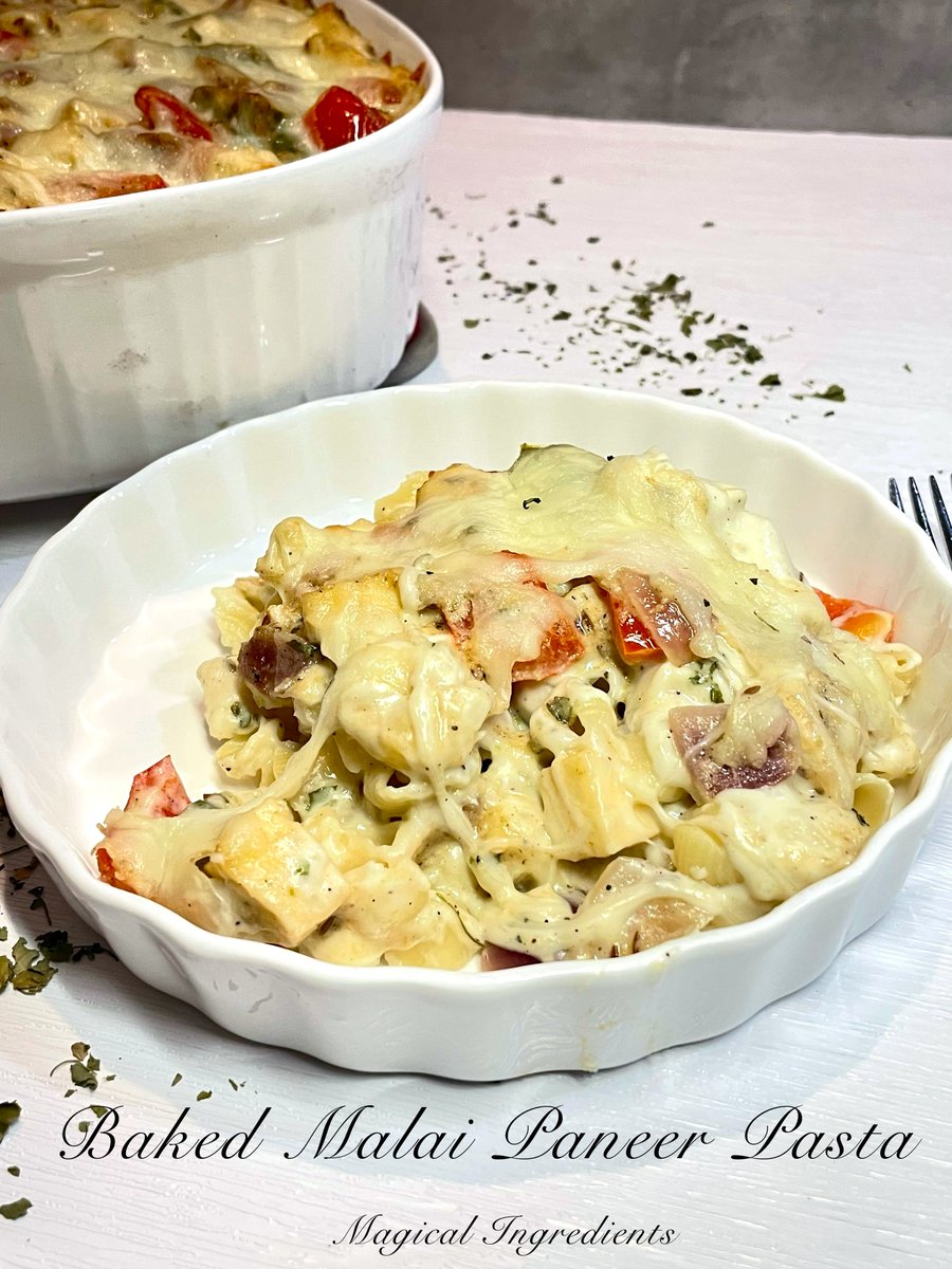 #Baked #Malai #Paneer #Pasta is a perfect #cheesy and #flavorful meal to make for any day. Layers of #creamy #whitesauce with a touch of #Indianflavors, the #malaipaneertikka with pasta makes a #delicious #comfortmeal #fusionrecipes #macandcheese go.shr.lc/3GggqP4