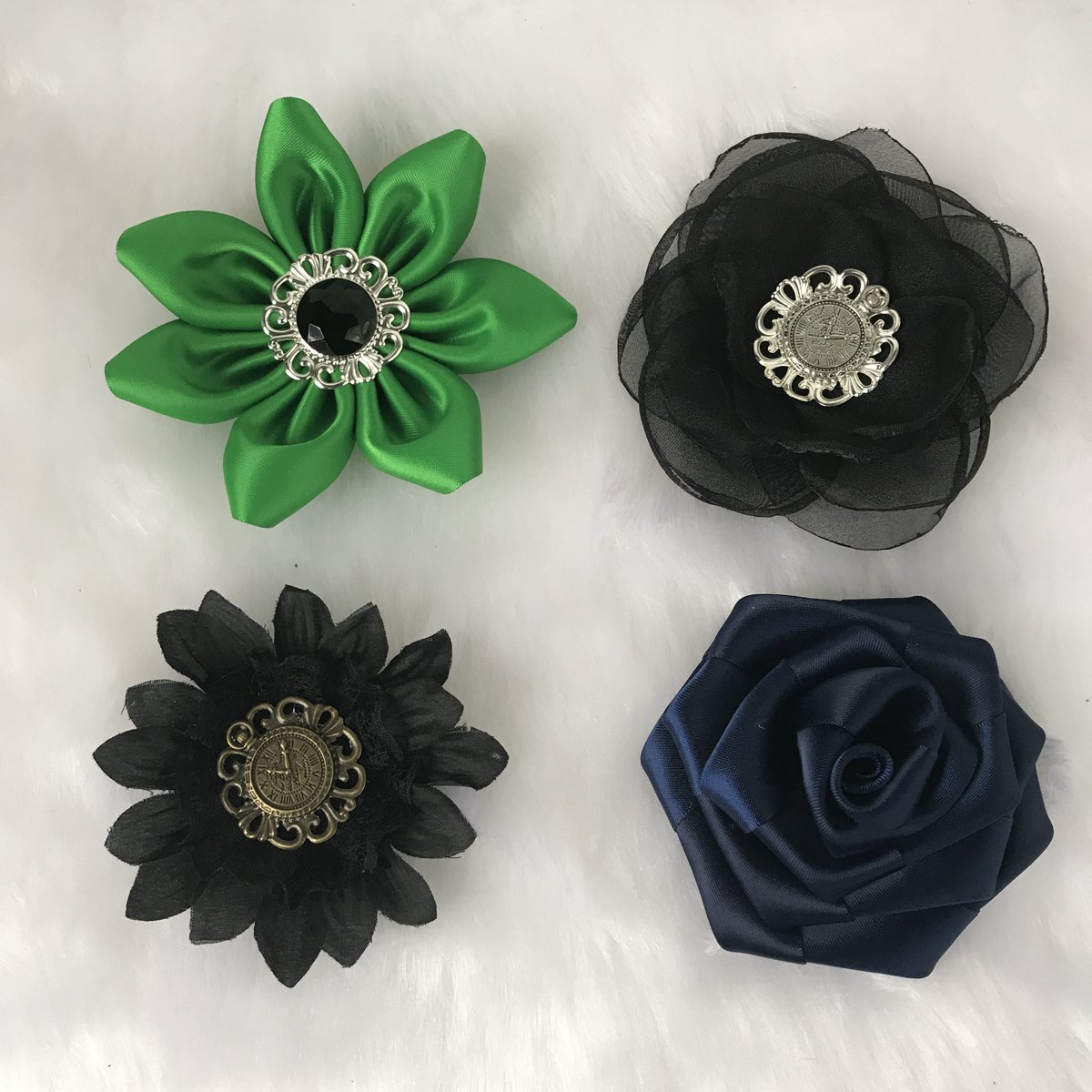 I made a bunch of handmade flowers to go on steampunk hats!  Which style is your favorite? #hatmaking #handmadeflowers #fashiondesigner #gothicbeauty #steampunkstyle #auralynne