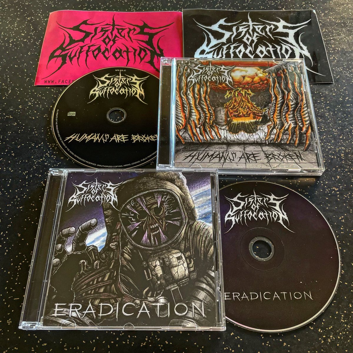 TheTrueAsgard's tweet photo. New arrival:
Sisters of Suffocation "Humans are Broken" and "Eradication" CDs, plus two stickers.
From Sisters of Suffocation's Bandcamp.
#SistersOfSuffocation #HumansAreBroken #Eradication #CD #Sticker https://t.co/ENIgncv0i0