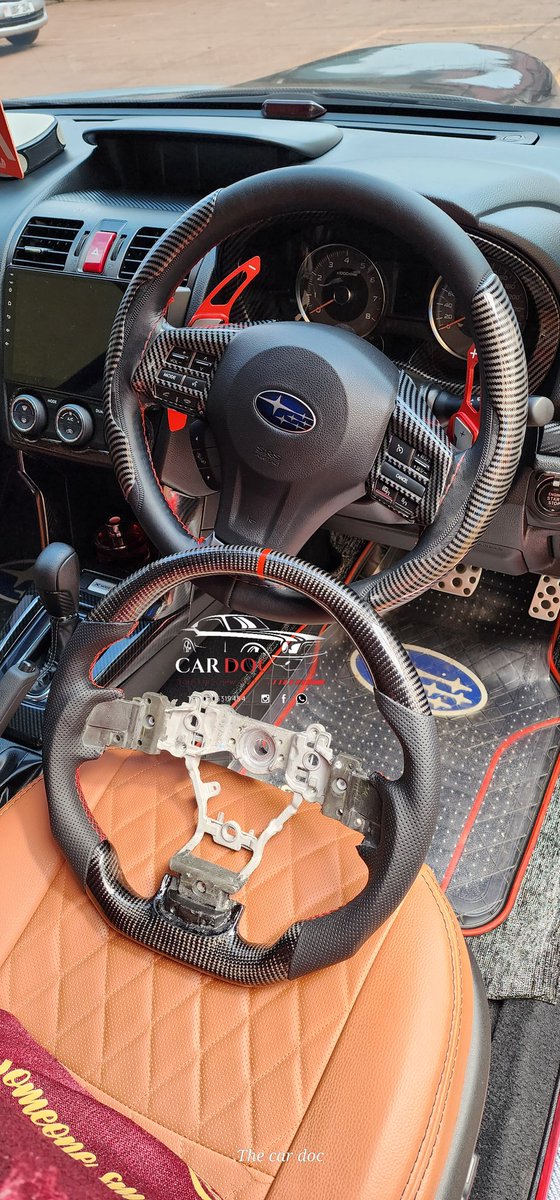 The_Car_Doc's tweet photo. Forester XT carbon fiber jet wheel steering retrofit..for a similar upgrade visit us #cardocug #kampala #Uganda https://t.co/7hK0AjlLZL