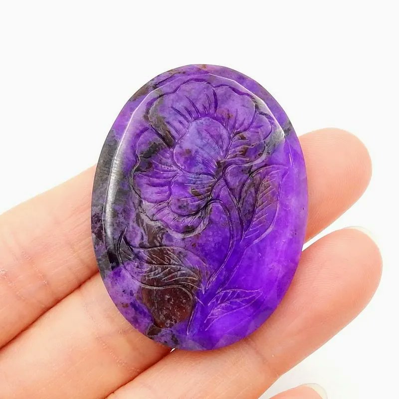TanriaElemental's tweet photo. #MagicalThings : Sugilite! This crystal is a January birthstone which brings balance, enhances ambition, and provides protection. The origins of violets are tied to the Greek myth of Cybele &amp; Attis so the color of this gem, also known as cybelene, reflects that of the flower. https://t.co/0V2pl30gkB