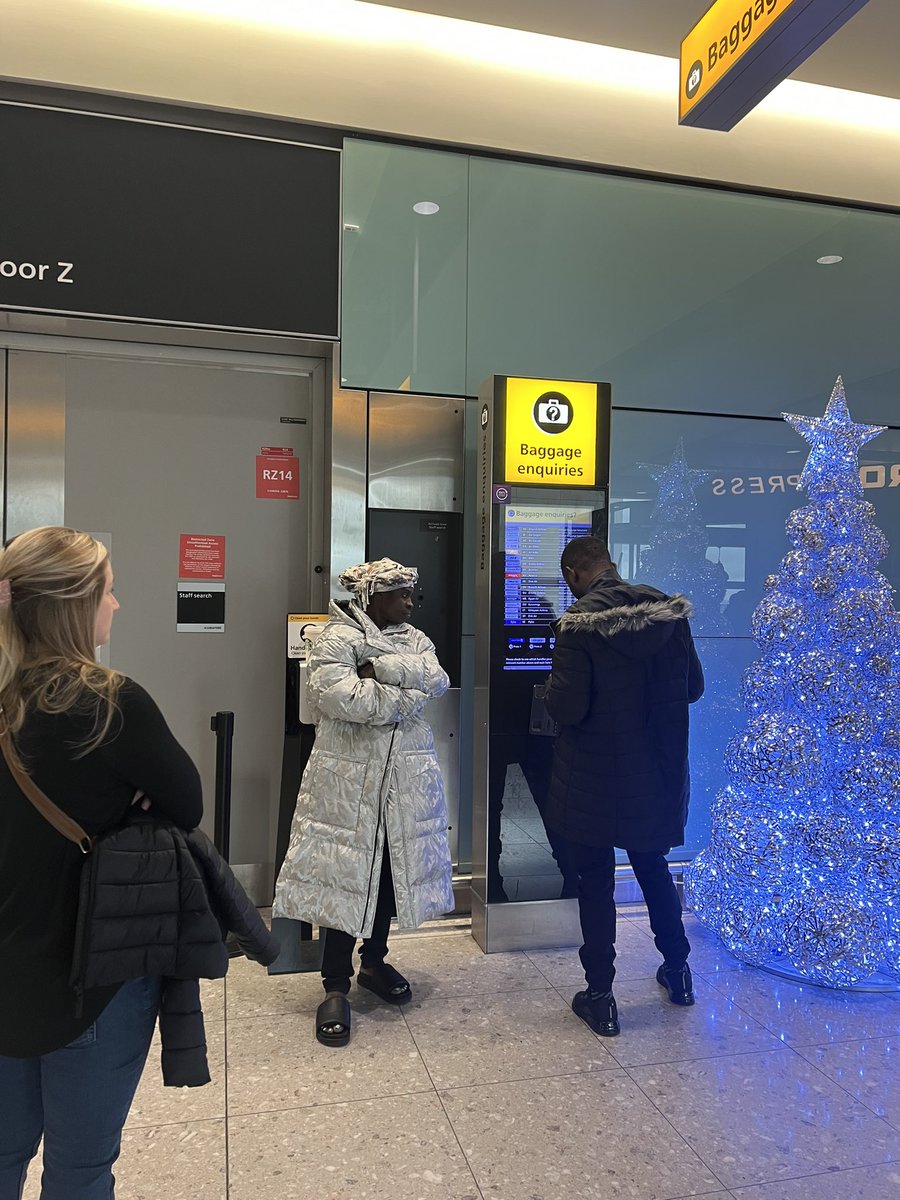 RebeccaLiggero's tweet photo. No help from @lufthansa at check in area, said my bag is in a warehouse which it is not, I can see from apple tag. Was sent downstairs by a manager to this phone on arrivals floor…a line of course. She said can take 1 hr for someone to answer @DailyMailUK @CNN @SkyNews https://t.co/q45U8MhTQE
