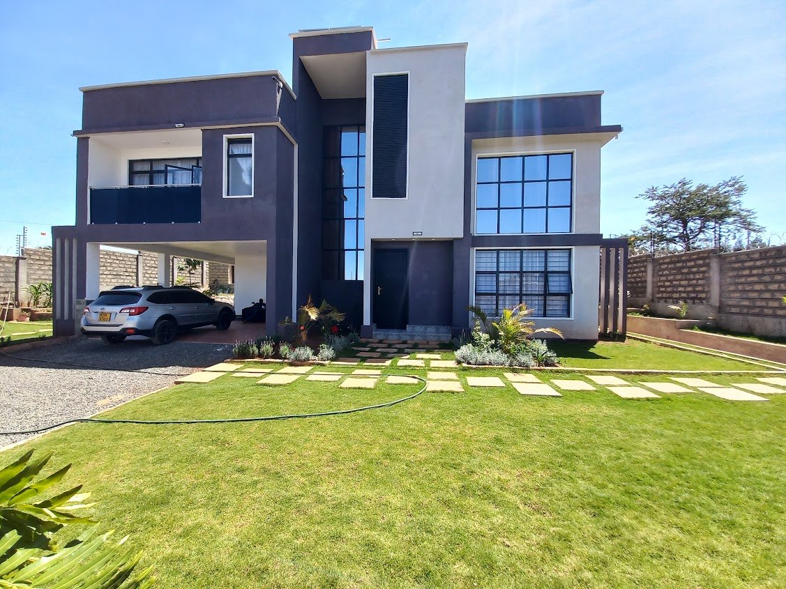 Proposed Design     vs       Built house with a few changes made during the construction period.